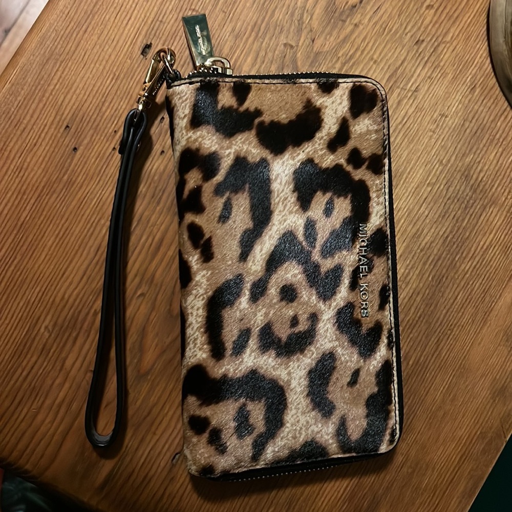 BRAND NEW Michael Kors calf hair zip around wristlet wallet. Matching bag avail